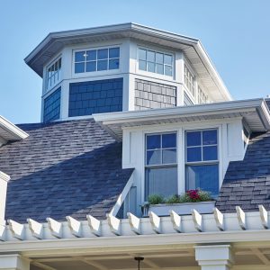 luxury-suburban-home-with-turret-clear-blue-sky