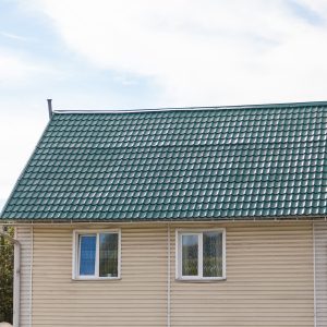 roof-old-wooden-house-covered-with-sheets-green-metal-tiles